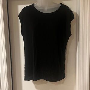 Rachel Rachel Roy. Black shirt in front. Gray textured material on back.